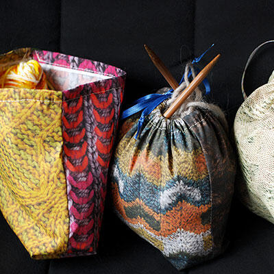 small drawstring bags made from fabric that's printed with colorful knit designs