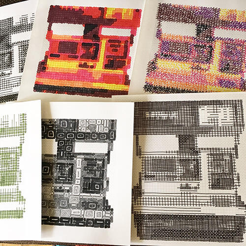 six colored-in pixel art pictures of a polaroid camera, each in different styles, mostly in black pen or shades of reds